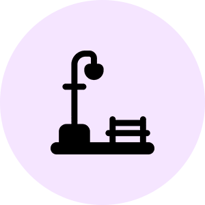Streetlamp and bench icon on purple circle.
